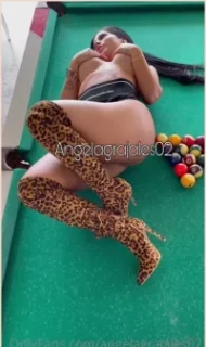 Angela Grajales rocking in a bold video with a leopard outfit on the pool table